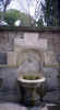 A small fountain on the hill above